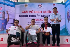 Các lực sĩ nhận huy chương trong thi đấu môn cử tạ. Ảnh: PARALYMPICVN