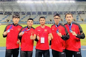 Tổ tiếp sức 4x400m nam Việt Nam đã giành HCB tại Đài Bắc Trung Hoa và có kết quả vượt kỉ lục quốc gia. Ảnh: VĂN THÀNH