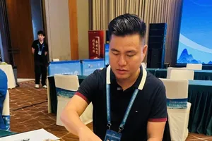 Lại Lý Huynh giành quyền vào chung kết cá nhân cờ tiêu chuẩn. Ảnh: VXF