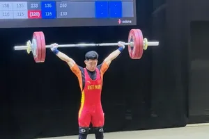 Tuyển thủ Trần Minh Trí là một trong những gương mặt quan trọng được cử tạ Việt Nam cử tập huấn tại Trung Quốc. Ảnh: NGUYỄN HUY