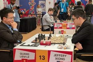 Lê Quang Liêm thi đấu với Xiong tại trận đầu của vòng 3. Ảnh: INDIA CHESS