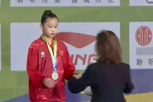 VĐV wushu Việt Nam có kết quả huy chương tại giải đấu. Ảnh: BTC