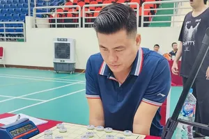 Kỳ thủ Lại Lý Huynh đang thi đấu giải vô địch cờ tướng quốc gia 2026. Ảnh: VXF