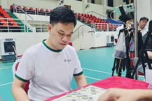 Kỳ thủ Vũ Quốc Đạt của đội cờ tướng TPHCM. Ảnh: VXF
