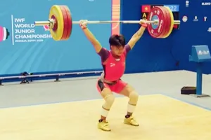 Lực sĩ A Tiêu đã tranh tài hạng cân 65kg nam tại giải vô địch trẻ thế giới ở Ai Cập. Ảnh: IWF