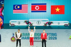 Lại Gia Thành của cử tạ Việt Nam có thành tích HCĐ tại giải châu Á 2026. Ảnh: MINH MINH
