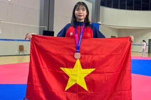 Võ sĩ Bạc Thị Khiêm từng giành HCĐ tại ASIAD 19 ở hạng cân 67kg nữ. Ảnh: BẠC KHIÊM