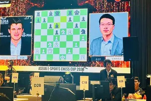 Trận bán kết của giải đấu giữa Lê Quang Liêm và Magnus Carlsen thu hút sự quan tâm của giới chuyên môn. Ảnh: VIETNAM CHESS