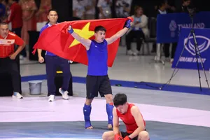 Võ sĩ Quàng Văn Minh từng có thành tích HCV tại SEA Games 33-2025 và dự kiến sẽ được cử tham dự ASIAD 20. Ảnh: DŨNG PHƯƠNG