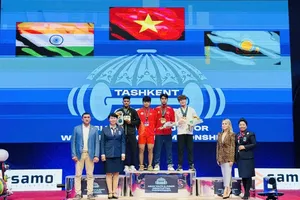 Lực sĩ trẻ của cử tạ Việt Nam có thành tích HCV tại giải đấu năm nay ở Uzbekistan. Ảnh: NGUYỄN HUY