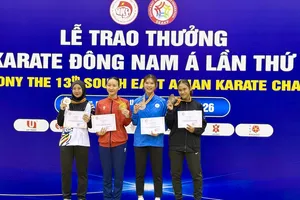 Võ sĩ Hoàng Thị Mỹ Tâm (áo đỏ) vừa giành HCV tại Giải vô địch Đông Nam Á 2026 nhưng không kịp tham dự ASIAD 20 vì chấn thương. Ảnh: MINH CHIẾN