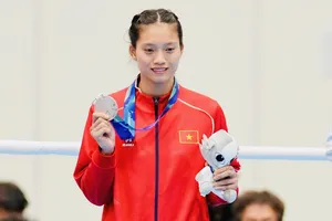 Võ sĩ Nguyễn Thị Tâm giành HCB tại ASIAD 20. Ảnh: LƯỢNG LƯỢNG