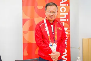 Trưởng đoàn thể thao Việt Nam tại ASIAD 20 Nguyễn Hồng Minh. Ảnh: LƯỢNG LƯỢNG