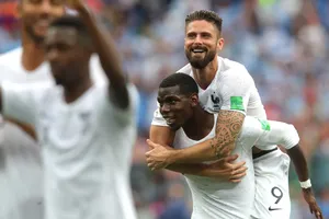 Giroud và Pogba thời còn cùng khoác áo tuyển Pháp. Ảnh: Getty Images