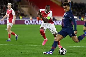 Desire Doue lập cú đúp giúp PSG thắng ngược Monaco tại play-off lượt đi. Ảnh: Getty Images