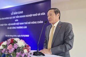 Vietnamese Assoc. in Vientiane funds new building of Lao Dept. of SME Promotion