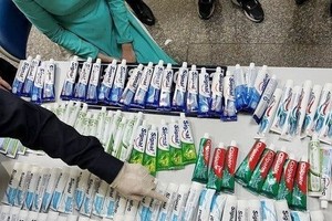 Flight attendants transporting drug case: 22 cases filed, 65 charged