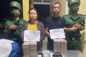 Two individuals smuggling 34 heroin packages arrested at Vietnam-Laos border