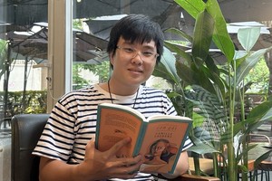 Delivery man working as book translator