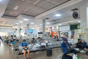 Sparse passengers at bus, train stations during holiday