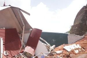 Landslide claims lives of coffee shop owners