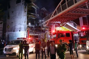 Suspect confesses to setting cafe fire, killing 11, over dispute