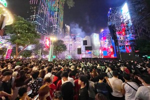 HCMC residents joyfully celebrate New Year 2025