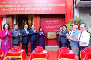 Image of President Ho Chi Minh drafting Declaration of Independence recreated
