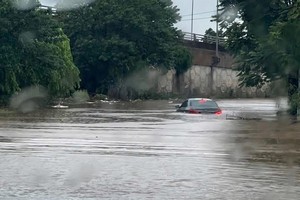 Storm-driven flooding disrupts life in Hanoi