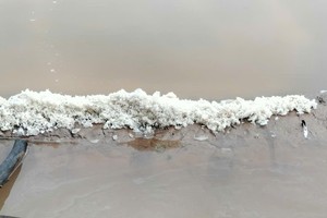 Unseasonal rains disrupt salt production in Ca Mau Province