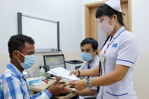 HCMC leader urges substance over targets in universal health screening