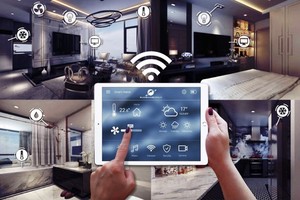 With a tablet, the owner of a domotics can easily monitor and control smart devices in his or her house.