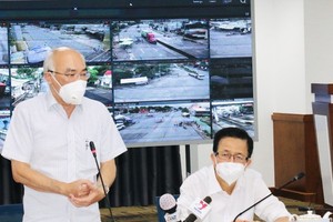 The summary meeting at the end of the first day of the 14-day stricter social distance period in HCMC.