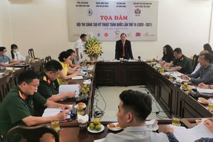 Dr. Le Xuan Thao, Vice Chairman of the Standing Committee of VIFOTEC, is delivering his speech in the meeting. (Photo: SGGP)