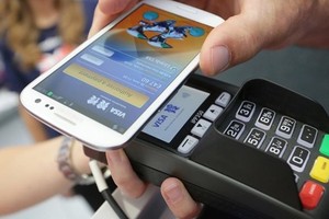 A type of cashless payment (Photo: VNA)