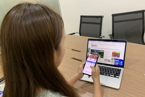 Thanks to CyO, residents in apartment buildings in HCMC has more chances to interact with their neighbors online (Photo: SGGP)
