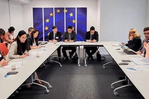 Minister Le Minh Hoan is working with EC in Brussels (Belgium)