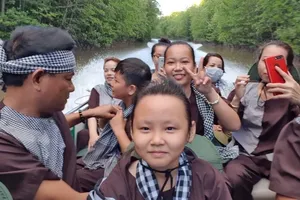 Tourists in a tour to the National Park in Ca Mau Province of the Mekong Delta