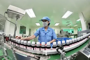 The production line at a plant of OPC Pharmaceutical JSC. – a green business sited in Tan Uyen City of Binh Duong Province (Photo: SGGP)