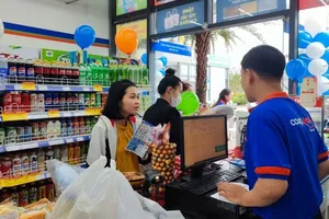 Consumers are choosing goods at a Co.op Smile convenience store 