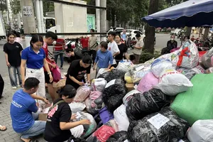 Volunteers are receiving flood relief supplies in HCMC before sending to flooding areas