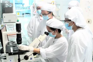 Biotechnology students at the University of Science (VNU-HCM) during a practical session 