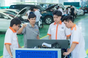 Students at Dong An High-Tech College are actively engaging in a practical training session