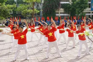 A mass gymnastics performance to passionately enhance health by dedicated members of the women’s union (Photo: SGGP)