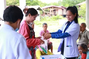 The dedicated medical staff from HCMC are examining the health of local residents in Attapeu Province, Laos 