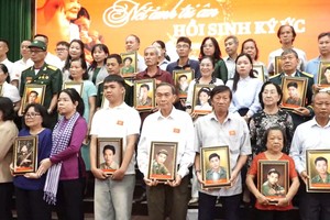 Restored photographs bring long awaited comfort to families of fallen soldiers