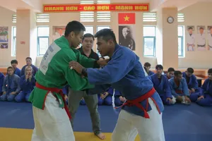  Võ sĩ là Lê Đức Đông và Trần Thương quyết tâm bảo vệ tấm HCV ở kỳ SEA Games 3 năm trước ngay trên nhà. Ảnh: Dũng Phương