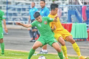 Bình Phước và Quảng Nam chia điểm với tỷ số 0-0. Ảnh: DŨNG PHƯƠNG 