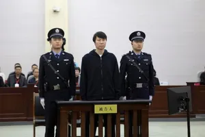 Li Tie tại tòa. Ảnh: CCTV