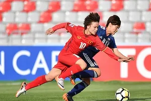 Đội tuyển nữ Việt Nam trong trận thua 0-7 trước Nhật Bản tại Asiad 2018, nhưng cả hai cùng vào vòng trong. Ảnh: AFC